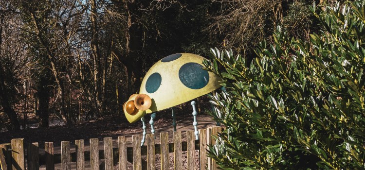 Sculpture of a bug in the woods
